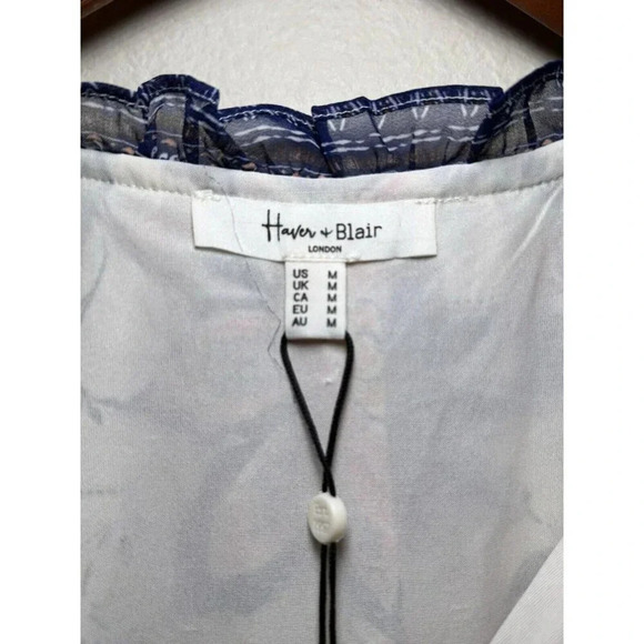 Floral Print Blouse with Navy Accents - Picture 5 of 7